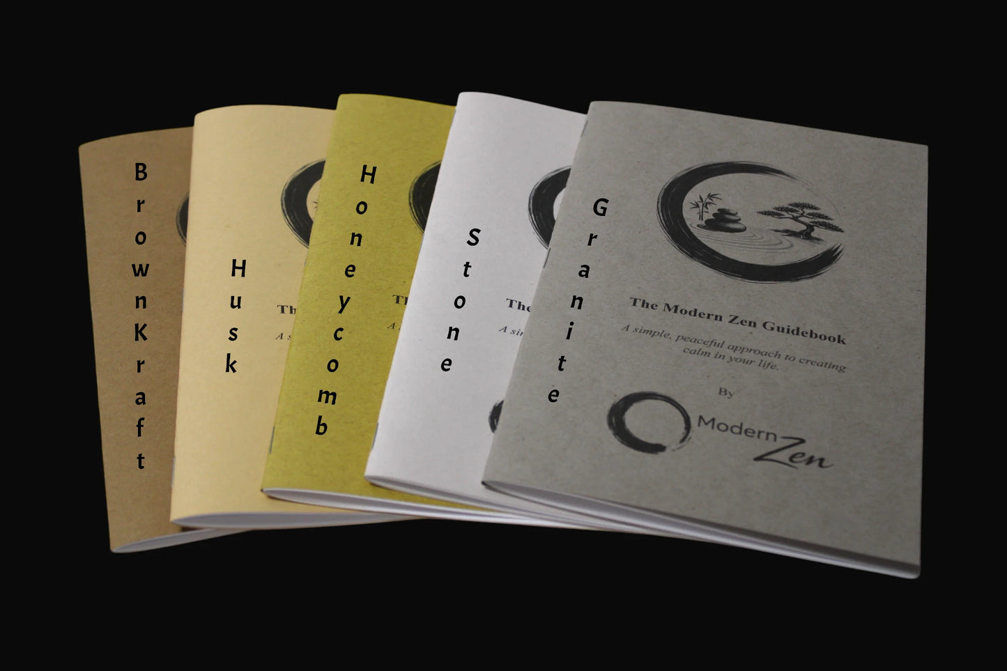 Collection of books titled "The Modern Zen Guidebook" by Modern Zen, in 5 different colors on a black background.